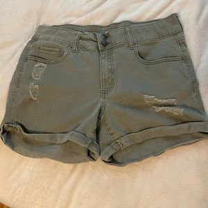Olive green ripped midi shorts. Size Medium